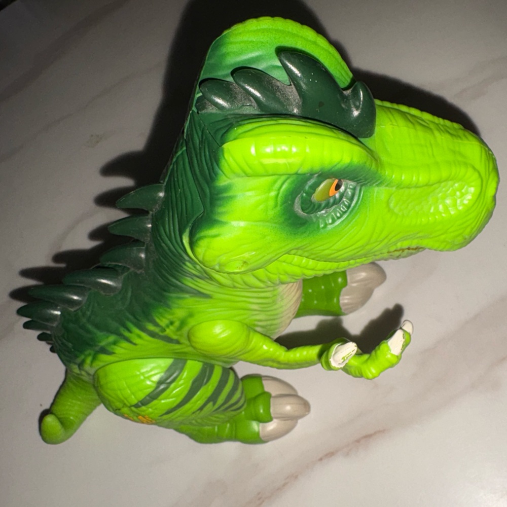 Fun Green Dinosaur Toy Size 8.5”x13.5” able to bite in game time.